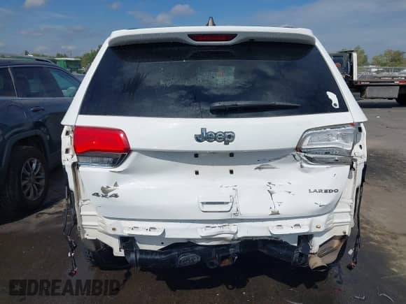 2018 Jeep Grand Cherokee Altitude z VIN 1C4RJFAGXJC504400, wystawiony jako IAAI lot #43318140 z przebiegiem 100 572 mil mil oraz . Historia ofert i sprzedaży dostępna na DreamBid. Obrazek 6.