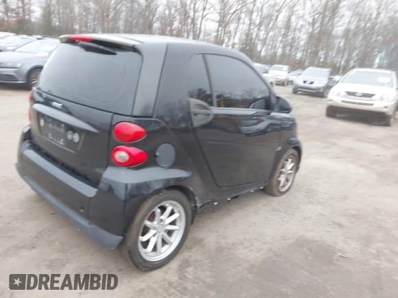✅ 2009 Smart fortwo Pure • VIN: WMEEJ31X49K254488 • Lot: 43818664. Listed on IAAI with Not provided. Free auction sales archive from the USA and detailed vehicle history report at DreamBid. Image 4.