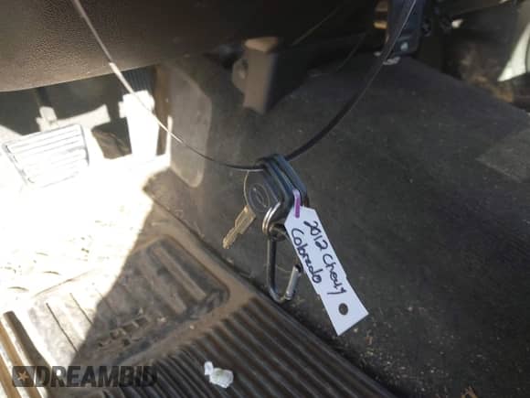 2012 Chevrolet Colorado Work Truck with VIN 1GCESBF99C8161891, listed as a IAAI auction lot 43005636 with 144,193 mi miles and . Bid and sale history available at DreamBid. Image 11.