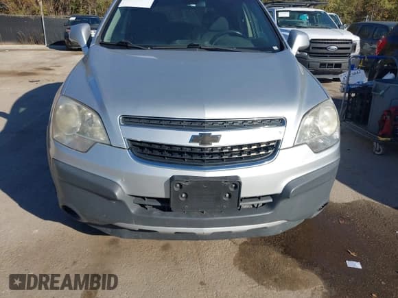 ✅ 2014 Chevrolet Captiva Sport LS • VIN: 3GNAL1EK1ES543098 • Lot: 43633397. Wystawiony na IAAI z przebiegiem 199 465 mil. Bezpłatny archiwum sprzedaży aukcyjnych z USA i szczegółowy raport historii pojazdu na DreamBid. Zdjęcie 6.