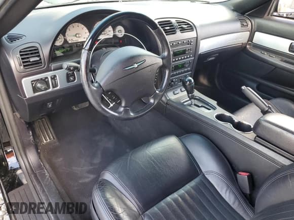 ✅ 2004 Ford Thunderbird Deluxe • VIN: 1FAHP60A84Y105845 • Lot: 87201715. Listed on Copart with 35,895 mi. Free auction sales archive from the USA and detailed vehicle history report at DreamBid. Image 8.