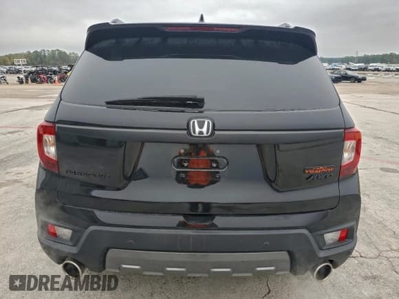 ✅ 2023 Honda Passport TrailSport • VIN: 5FNYF8H63PB008839 • Lot: 95703575. Wystawiony na Copart z przebiegiem 27 511 mil. Bezpłatny archiwum sprzedaży aukcyjnych z USA i szczegółowy raport historii pojazdu na DreamBid. Zdjęcie 6.