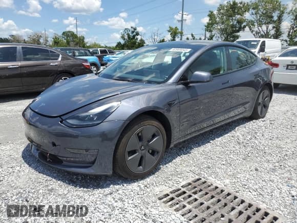 ✅ 2023 Tesla Model 3 • VIN: 5YJ3E1EA1PF407231 • Лот: 60969045. Опубликован ранее на Copart с пробегом 34 811 миль. Бесплатный доступ к архиву аукционных продаж из США и подробный отчёт об истории автомобиля на DreamBid. Изображение 1.