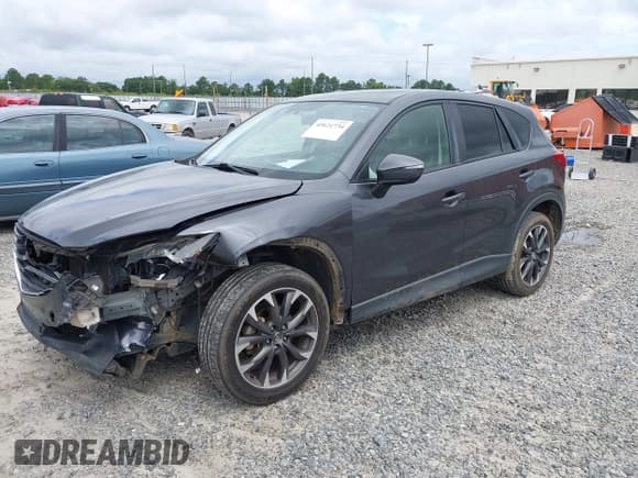 ✅ 2016 Mazda CX-5 Grand Touring • VIN: JM3KE2DY6G0895534 • Лот: 42621734. Опубликован ранее на IAAI с пробегом 173 294 миль. Бесплатный доступ к архиву аукционных продаж из США и подробный отчёт об истории автомобиля на DreamBid. Изображение 2.