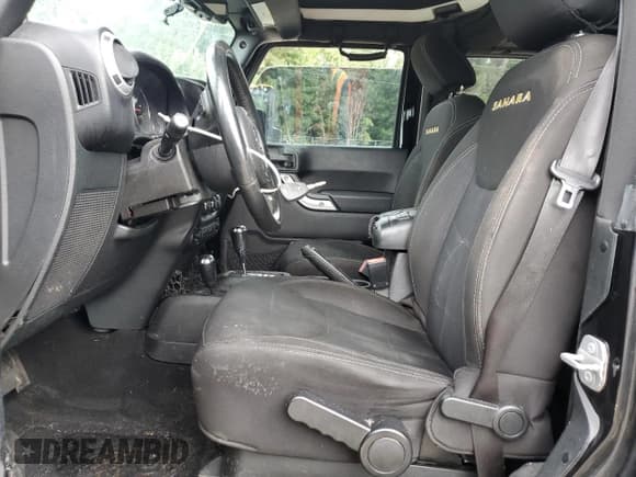 ✅ 2014 Jeep Wrangler Sahara • VIN: 1C4GJWBG5EL204288 • Lot: 83969665. Wystawiony na Copart z przebiegiem Nie podano. Bezpłatny archiwum sprzedaży aukcyjnych z USA i szczegółowy raport historii pojazdu na DreamBid. Zdjęcie 7.