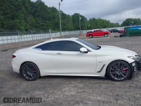 ✅ 2017 Infiniti Q60 Red Sport 400 • VIN: JN1FV7EK1HM610415 • Lot: 42493610. Listed on IAAI with 107,122 mi. Free auction sales archive from the USA and detailed vehicle history report at DreamBid. Image 13.