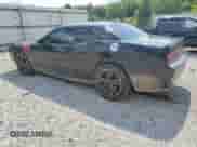 2013 Dodge Challenger SXT с VIN 2C3CDYAGXDH594209, выставлен на аукционе Copart как лот 56491185 с пробегом 113 227 миль миль и Списание • Salvage title. История ставок и продаж доступна на DreamBid. Изображение 2.