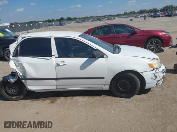 ✅ 2007 Toyota Corolla CE • VIN: JTDBR32E870104318 • Лот: 43485388. Опубликован ранее на IAAI с пробегом 299 999 миль. Бесплатный доступ к архиву аукционных продаж из США и подробный отчёт об истории автомобиля на DreamBid. Изображение 13.