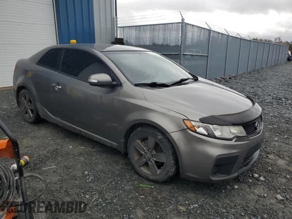 ✅ 2010 Kia Forte EX • VIN: KNAFU6A27A5106433 • Lot: 81853755. Listed on Copart with 266,671 mi. Free auction sales archive from the USA and detailed vehicle history report at DreamBid. Image 4.