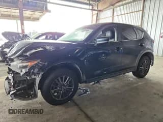 ✅ 2020 Mazda CX-5 Touring • VIN: JM3KFACM9L0791412 • Lot: 92458585. Wystawiony na Copart z przebiegiem 166 155 mil. Bezpłatny archiwum sprzedaży aukcyjnych z USA i szczegółowy raport historii pojazdu na DreamBid. Zdjęcie 1.