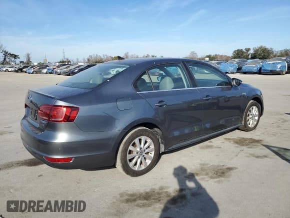 ✅ 2013 Volkswagen Jetta Hybrid SEL Premium • VIN: 3VW637AJ8DM295219 • Lot: 42834335. Listed on Copart with 97,172 mi. Free auction sales archive from the USA and detailed vehicle history report at DreamBid. Image 3.