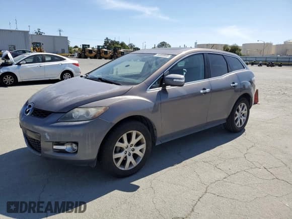 ✅ 2009 Mazda CX-7 Grand Touring • VIN: JM3ER29L090216696 • Lot: 56958805. Listed on Copart with 145,360 mi. Free auction sales archive from the USA and detailed vehicle history report at DreamBid. Image 1.