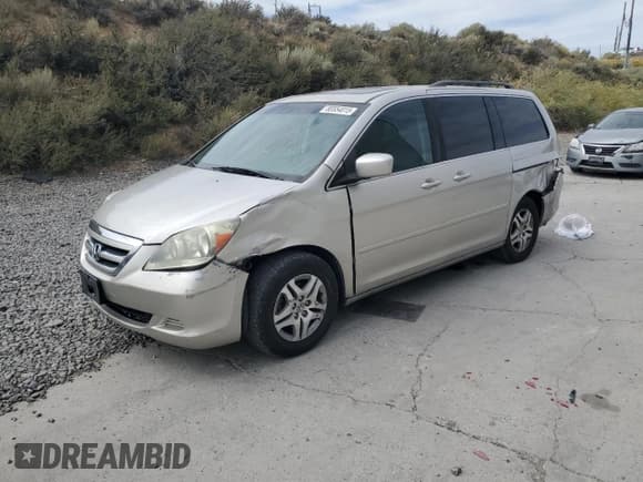 ✅ 2006 Honda Odyssey EX-L • VIN: 5FNRL38656B410666 • Лот: 80554015. Опубликован ранее на Copart с пробегом 243 001 миль. Бесплатный доступ к архиву аукционных продаж из США и подробный отчёт об истории автомобиля на DreamBid. Изображение 1.