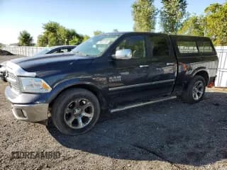✅ 2014 Ram 1500 Laramie • VIN: 1C6RR7JT3ES220377 • Лот: 84451185. Опубликован ранее на Copart с пробегом 243 757 миль. Бесплатный доступ к архиву аукционных продаж из США и подробный отчёт об истории автомобиля на DreamBid. Изображение 1.