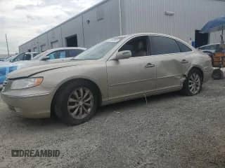 2008 Hyundai Azera Limited z VIN KMHFC46F58A332098, wystawiony jako Copart lot #69912545 z przebiegiem Nie podano mil oraz Szkoda całkowita • Salvage title. Historia ofert i sprzedaży dostępna na DreamBid. Obrazek 1.