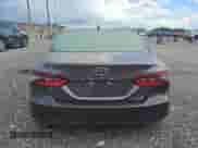 2023 Toyota Camry Hybrid LE with VIN 4T1C31AK3PU608653, listed as a Copart auction lot 59235965 with 57,095 mi miles and Clean title. Bid and sale history available at DreamBid. Image 6.