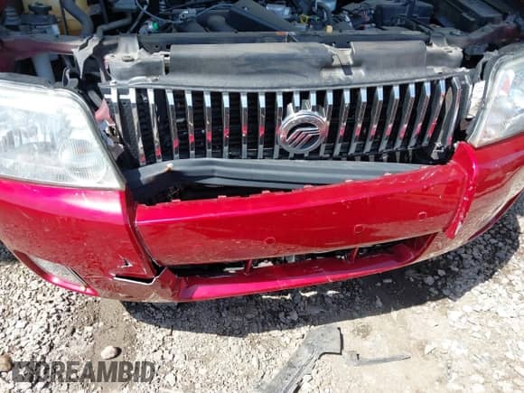 2006 Mercury Mariner Luxury z VIN 4M2YU56186KJ03260, wystawiony jako IAAI lot #42010188 z przebiegiem 103 673 mil mil oraz . Historia ofert i sprzedaży dostępna na DreamBid. Obrazek 12.