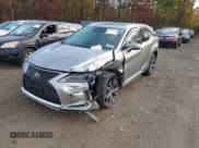 ✅ 2021 Lexus RX 350L • VIN: JTJHZKFA6M2030048 • Лот: 43586782. Опубликован ранее на IAAI с пробегом 30 738 миль. Бесплатный доступ к архиву аукционных продаж из США и подробный отчёт об истории автомобиля на DreamBid. Изображение 2.