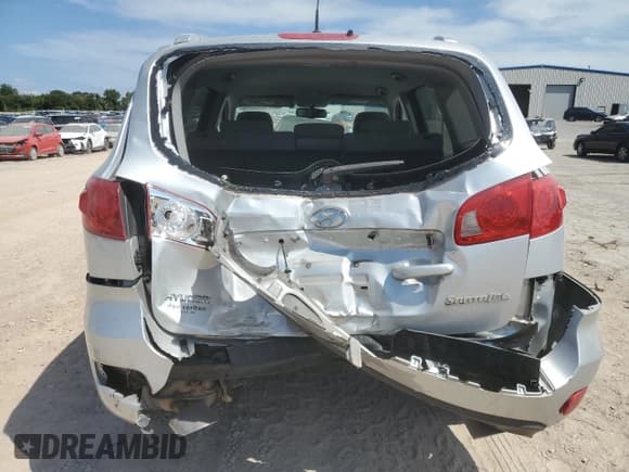 ✅ 2009 Hyundai Santa Fe SE • VIN: 5NMSH13E69H241802 • Lot: 70693734. Listed on Copart with 126,723 mi. Free auction sales archive from the USA and detailed vehicle history report at DreamBid. Image 6.