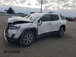 ✅ 2021 GMC Acadia SLT • VIN: 1GKKNMLS4MZ167305 • Лот: 90289695. Опубликован ранее на Copart с пробегом 74 484 миль. Бесплатный доступ к архиву аукционных продаж из США и подробный отчёт об истории автомобиля на DreamBid. Изображение 1.
