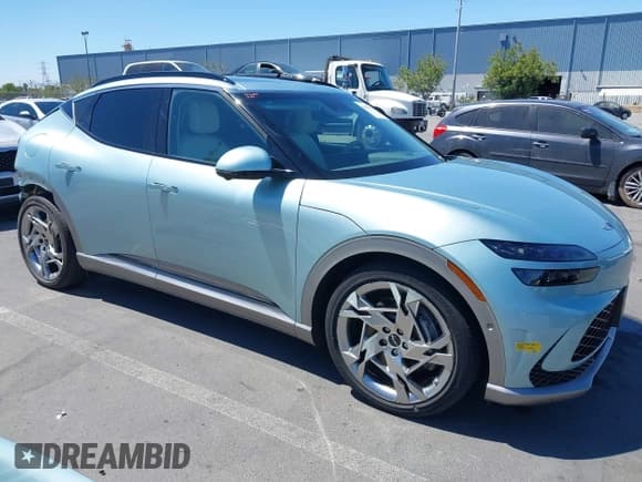 ✅ 2023 Genesis GV60 Performance • VIN: KMUKEDTB0PU002930 • Lot: 42689223. Wystawiony na IAAI z przebiegiem 20 044 mil. Bezpłatny archiwum sprzedaży aukcyjnych z USA i szczegółowy raport historii pojazdu na DreamBid. Zdjęcie 1.