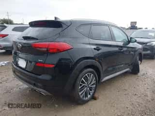 2021 Hyundai Tucson SEL with VIN KM8J3CAL9MU341302, listed as a IAAI auction lot 43238039 with 115,042 mi miles and . Bid and sale history available at DreamBid. Image 4.