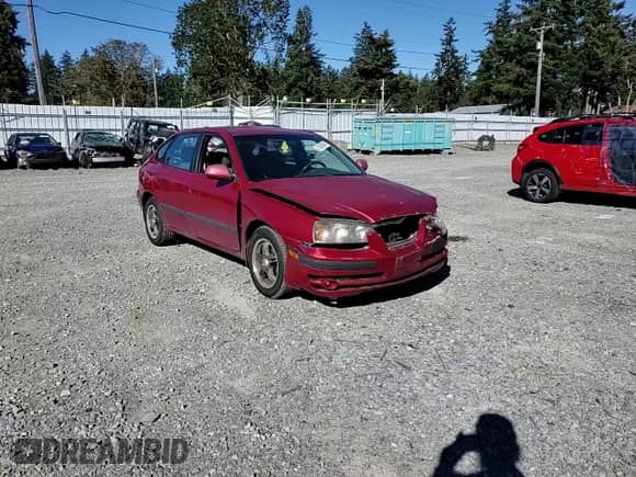 2005 Hyundai Elantra GLS z VIN KMHDN56DX5U132883, wystawiony jako Copart lot #73595994 z przebiegiem 112 317 mil mil oraz Szkoda całkowita • Salvage title. Historia ofert i sprzedaży dostępna na DreamBid. Obrazek 11.