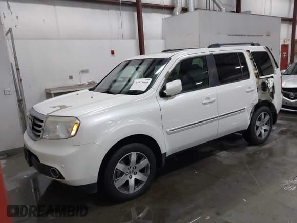 ✅ 2015 Honda Pilot Touring • VIN: 5FNYF4H90FB047566 • Lot: 43575660. Listed on IAAI with 103,472 mi. Free auction sales archive from the USA and detailed vehicle history report at DreamBid. Image 19.