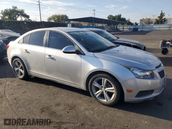 ✅ 2014 Chevrolet Cruze 2LT • VIN: 1G1PE5SB0E7335682 • Lot: 82730995. Listed on Copart with 136,256 mi. Free auction sales archive from the USA and detailed vehicle history report at DreamBid. Image 4.