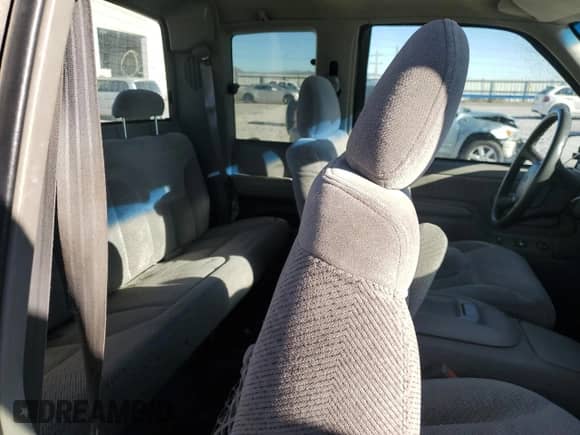 1999 Chevrolet Silverado 1500 z VIN 1GCEK19R6XR145346, wystawiony jako Copart lot #79735614 z przebiegiem 237 998 mil mil oraz Szkoda całkowita • Salvage title. Historia ofert i sprzedaży dostępna na DreamBid. Obrazek 11.