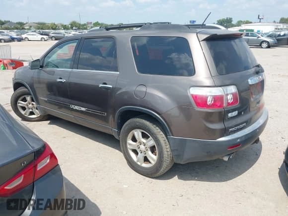 ✅ 2007 GMC Acadia SLT • VIN: 1GKEV33747J138716 • Lot: 43156882. Wystawiony na IAAI z przebiegiem 157 321 mil. Bezpłatny archiwum sprzedaży aukcyjnych z USA i szczegółowy raport historii pojazdu na DreamBid. Zdjęcie 3.