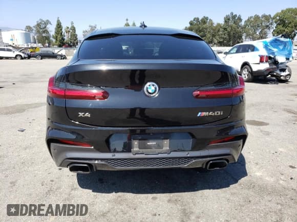 ✅ 2021 BMW X4 M40i • VIN: 5UX2V5C01M9F81840 • Lot: 56868653. Wystawiony na Copart z przebiegiem Nie podano. Bezpłatny archiwum sprzedaży aukcyjnych z USA i szczegółowy raport historii pojazdu na DreamBid. Zdjęcie 6.