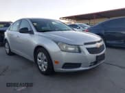 ✅ 2013 Chevrolet Cruze LS • VIN: 1G1PA5SH8D7110702 • Lot: 43585575. Listed on IAAI with 125,250 mi. Free auction sales archive from the USA and detailed vehicle history report at DreamBid. Image 1.
