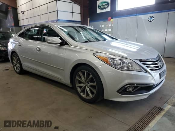 2016 Hyundai Azera z VIN KMHFG4JG1GA506784, wystawiony jako Copart lot #84911744 z przebiegiem 88 057 mil mil oraz Szkoda całkowita • Salvage title. Historia ofert i sprzedaży dostępna na DreamBid. Obrazek 4.