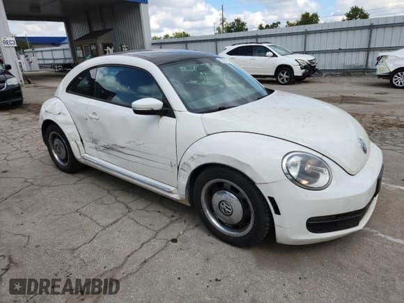 ✅ 2013 Volkswagen Beetle 2.5L • VIN: 3VWHX7AT6DM603406 • Lot: 69780225. Listed on Copart with 176,174 mi. Free auction sales archive from the USA and detailed vehicle history report at DreamBid. Image 4.