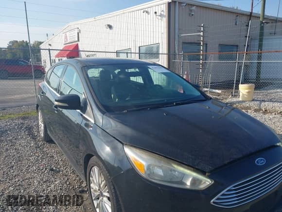 ✅ 2015 Ford Focus Titanium • VIN: 1FADP3N24FL214270 • Лот: 43492440. Опубликован ранее на IAAI с пробегом 248 010 миль. Бесплатный доступ к архиву аукционных продаж из США и подробный отчёт об истории автомобиля на DreamBid. Изображение 1.
