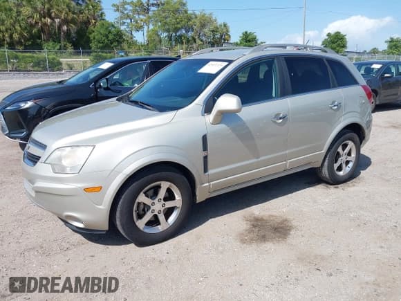 ✅ 2013 Chevrolet Captiva Sport LT • VIN: 3GNAL3EK4DS557197 • Lot: 42011329. Wystawiony na IAAI z przebiegiem 164 539 mil. Bezpłatny archiwum sprzedaży aukcyjnych z USA i szczegółowy raport historii pojazdu na DreamBid. Zdjęcie 2.