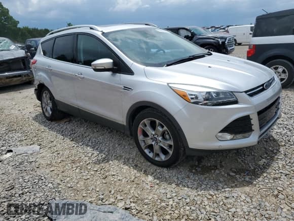 ✅ 2015 Ford Escape Titanium • VIN: 1FMCU0JXXFUA50866 • Lot: 60540445. Listed on Copart with 107,482 mi. Free auction sales archive from the USA and detailed vehicle history report at DreamBid. Image 4.