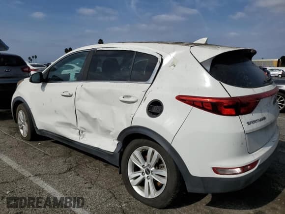 ✅ 2018 Kia Sportage LX • VIN: KNDPM3AC7J7478115 • Лот: 91022805. Опубликован ранее на Copart с пробегом 87 530 миль. Бесплатный доступ к архиву аукционных продаж из США и подробный отчёт об истории автомобиля на DreamBid. Изображение 2.