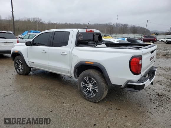 ✅ 2023 GMC Canyon 4WD AT4 • VIN: 1GTP6DEK3P1184837 • Лот: 44501054. Опубликован ранее на Copart с пробегом 2 236 миль. Бесплатный доступ к архиву аукционных продаж из США и подробный отчёт об истории автомобиля на DreamBid. Изображение 2.