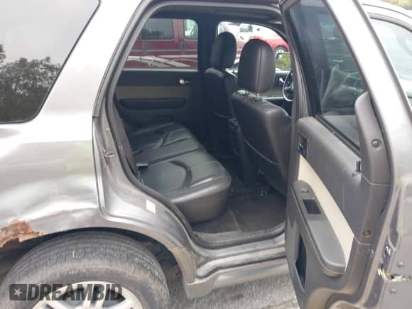 2010 Mercury Mariner Premier с VIN 4M2CN9H70AKJ30462, выставлен на аукционе IAAI как лот 43264181 с пробегом 169 789 миль миль и . История ставок и продаж доступна на DreamBid. Изображение 8.