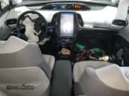 ✅ 2021 Toyota Prius Limited • VIN: JTDKAMFP0M3171451 • Лот: 41665075. Опубликован ранее на Copart с пробегом 53 040 миль. Бесплатный доступ к архиву аукционных продаж из США и подробный отчёт об истории автомобиля на DreamBid. Изображение 8.