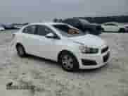 2015 Chevrolet Sonic LT z VIN 1G1JC5SHXF4103013, wystawiony jako Copart lot #71414114 z przebiegiem 169 575 mil mil oraz Szkoda całkowita • Salvage title. Historia ofert i sprzedaży dostępna na DreamBid. Obrazek 11.