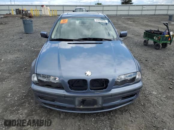 1999 BMW 3 Series 323i with VIN WBAAM3333XKC57572, listed as a Copart auction lot 57478895 with 177,561 mi miles and Salvage title. Bid and sale history available at DreamBid. Image 5.