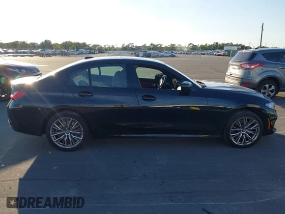 ✅ 2023 BMW 3 Series 330i • VIN: 3MW69FF08P8D42058 • Lot: 43630066. Listed on IAAI with 33,487 mi. Free auction sales archive from the USA and detailed vehicle history report at DreamBid. Image 13.