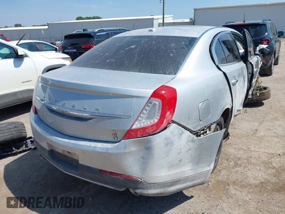 ✅ 2015 Lincoln MKS • VIN: 1LNHL9DK8FG608211 • Lot: 43154019. Listed on IAAI with 152,341 mi. Free auction sales archive from the USA and detailed vehicle history report at DreamBid. Image 4.