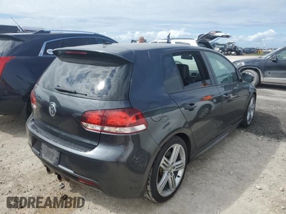 ✅ 2012 Volkswagen Golf R • VIN: WVWPF7AJ4CW301210 • Лот: 75675764. Опубликован ранее на Copart с пробегом 56 269 миль. Бесплатный доступ к архиву аукционных продаж из США и подробный отчёт об истории автомобиля на DreamBid. Изображение 3.