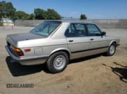 ✅ 1984 BMW 5 Series • VIN: WBADA810507588767 • Lot: 73006384. Listed on Copart with 13,162 mi. Free auction sales archive from the USA and detailed vehicle history report at DreamBid. Image 3.