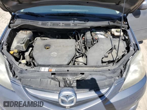 ✅ 2009 Mazda 5 Touring • VIN: JM1CR29L790356910 • Lot: 54738985. Listed on Copart with 141,514 mi. Free auction sales archive from the USA and detailed vehicle history report at DreamBid. Image 12.