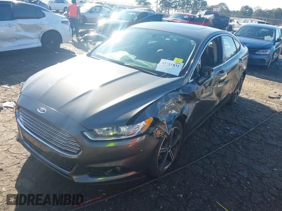 ✅ 2016 Ford Fusion Titanium • VIN: 3FA6P0K96GR140023 • Lot: 43714831. Listed on IAAI with 144,663 mi. Free auction sales archive from the USA and detailed vehicle history report at DreamBid. Image 6.